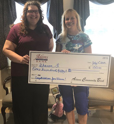 A HUGE congratulations to Sharon L. our 150th Anniversary winner for the month of June. Courtney and honorary Cheshire branch employee, Emmerich the Duck, were on hand to present Sharon with her winnings.